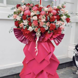 Đôn hoa chúc mừng tone đỏ hiện đại 