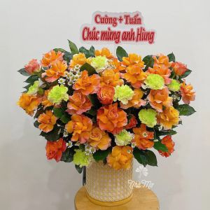 Giỏ hoa hồng cam mix cẩm chướng